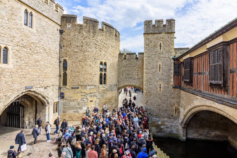 Tourists at Traitors gate in Tower of London, UK royalty free stock images