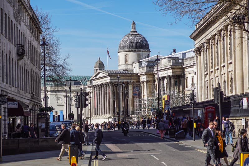 LONDON, UK - ARIL 2017 :Tourists in Trafalgar Square in front of the National Gallery HDR . royalty free stock images LONDON, UK - ARIL 2017 :Tourists in Trafalgar Square in front of the National Gallery HDR . royalty free stock images