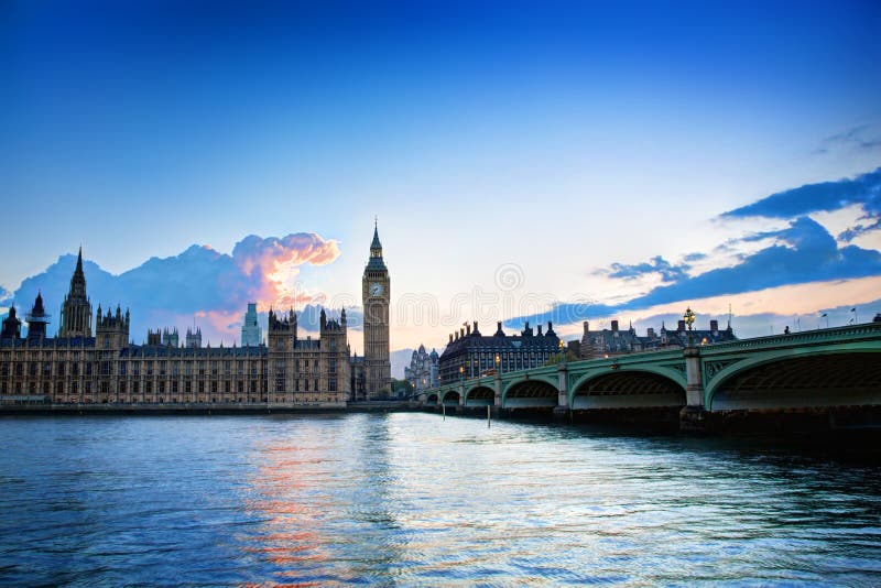 London, the UK. Big Ben, the Palace of Westminster at sunset. The icon of England. London, the UK. Big Ben, the Palace of Westminster at sunset. The icon of England