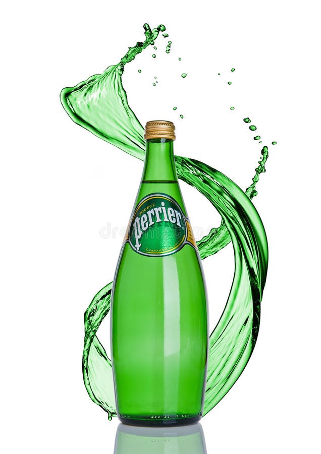 LONDON, UK -JANUARY 02, 201t: Bottle of Perrier sparkling water with splash. Perrier is a French brand of natural bottled mineral