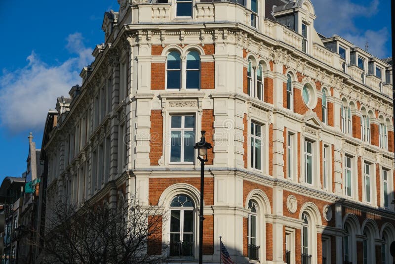 A Row of Brick Buildings with Black Doors on a Street in London Stock Image  - Image of architecture, english: 189002149