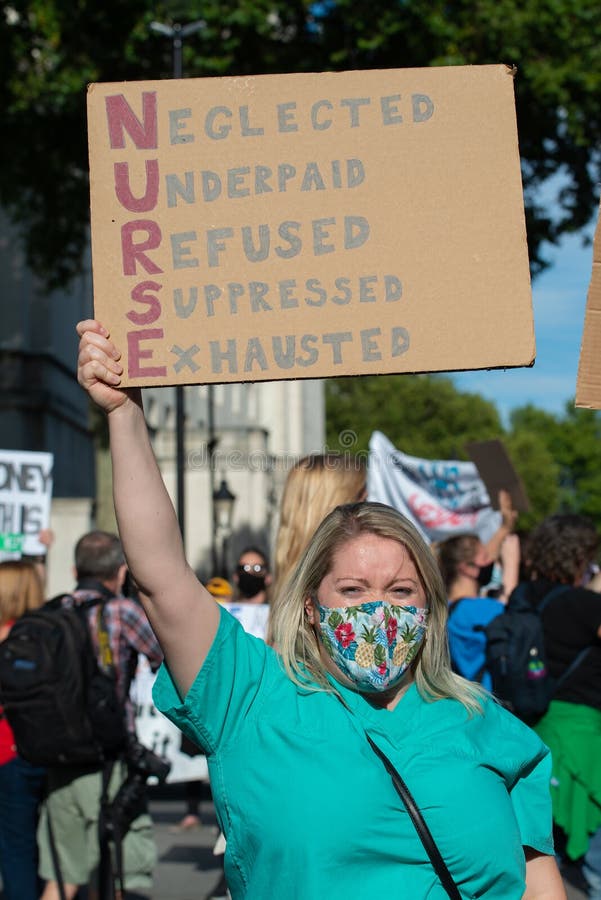 NHS workers in protest for a pay rise from the British Government. royalty free stock photos NHS workers in protest for a pay rise from the British Government. royalty free stock photos