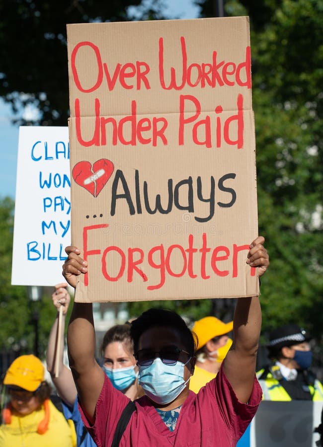NHS workers protest, demanding a pay rise from the British Government. stock photos NHS workers protest, demanding a pay rise from the British Government. stock photos