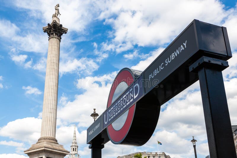 London Underground Station And Red Bus In Trafalgar Square Editorial