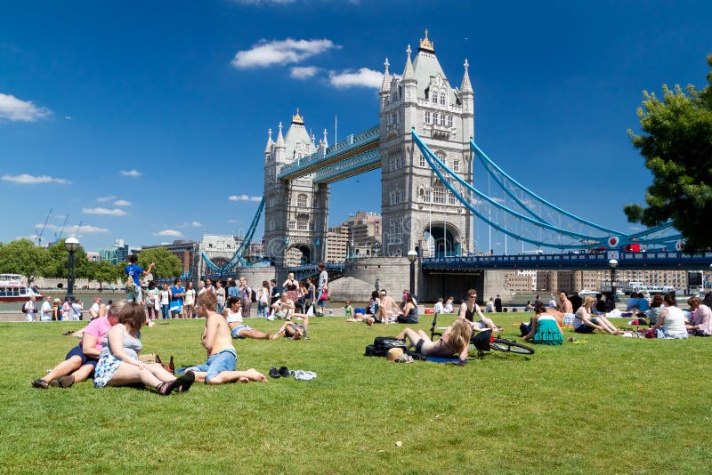 Londoners enjoying summer near Tower Bridge