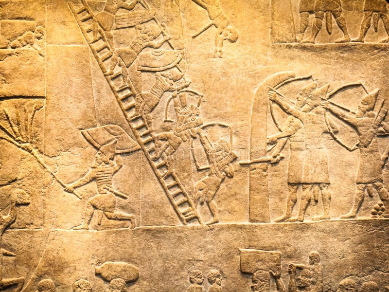 LONDYN, UK, BRITISH MUSEUM - szczegóły od asyryjczyk ściany obrazy royalty free LONDYN, UK, BRITISH MUSEUM - szczegóły od asyryjczyk ściany obrazy royalty free