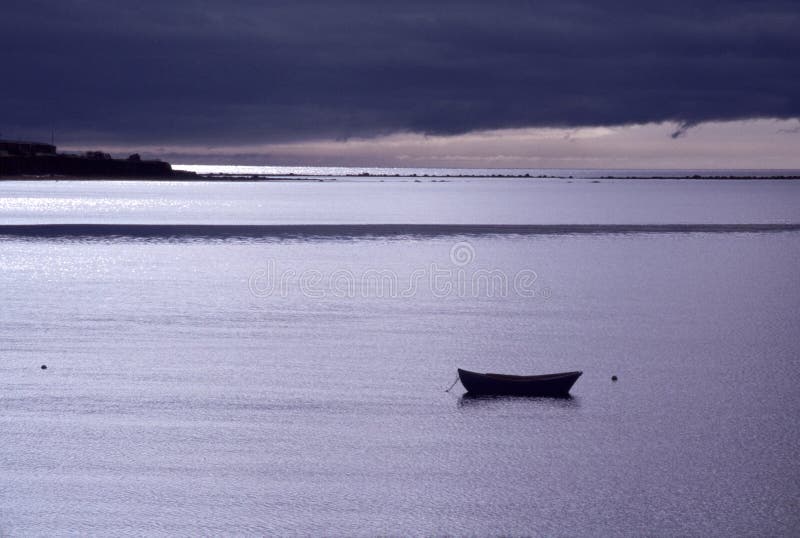 Lone Boat Moored at Twilight