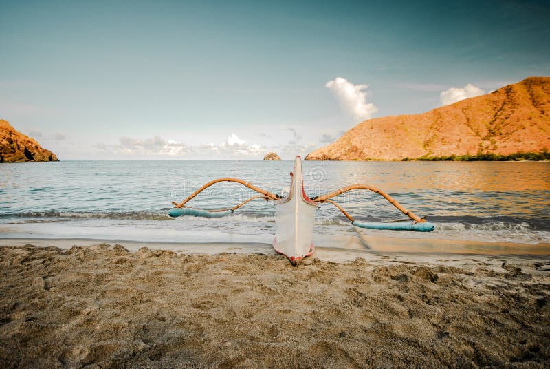 Lone boat at the shore of the beach at Zambales, Philippines