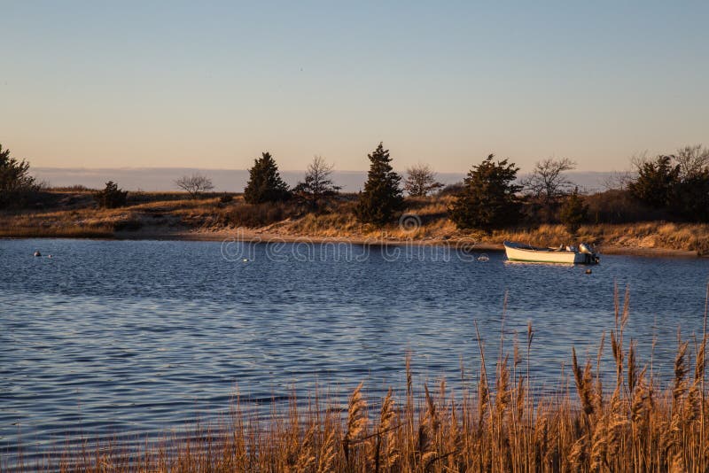 A lone boat at sunset, Sag Harbor, New York