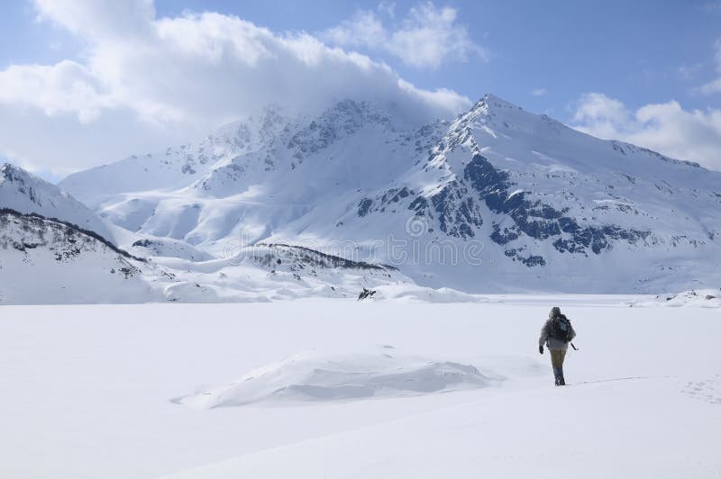 A lone hiker on the snow. Mont Cenis ( France ).