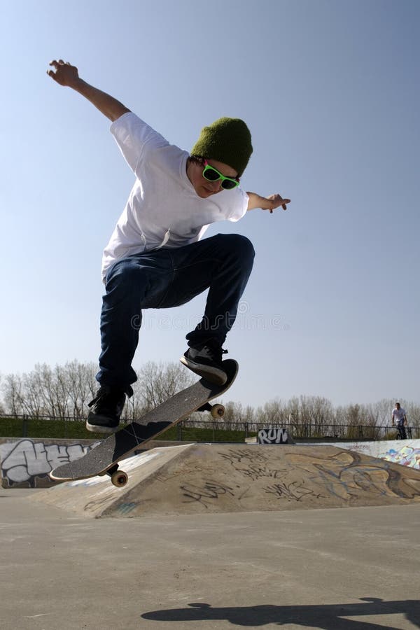 Lone Skateboarder Doing An Ollie Stock Image  Image of adult, weekend: 5286163