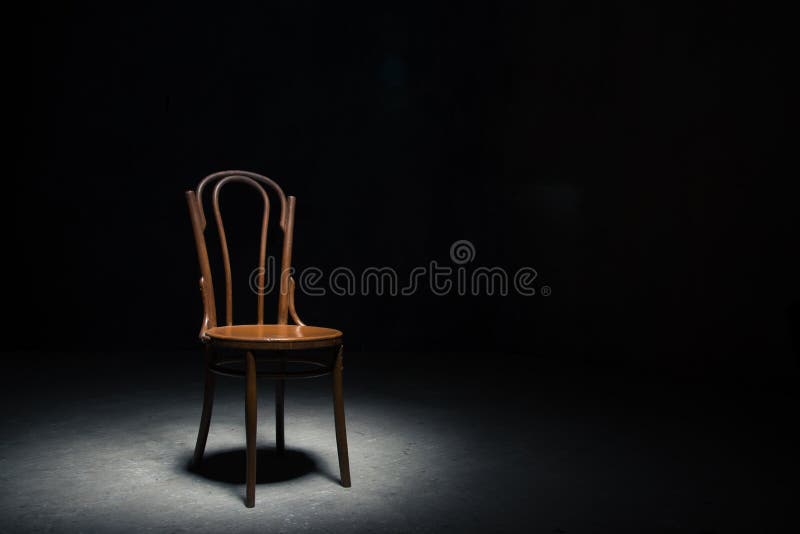 Lonely chair at the empty room