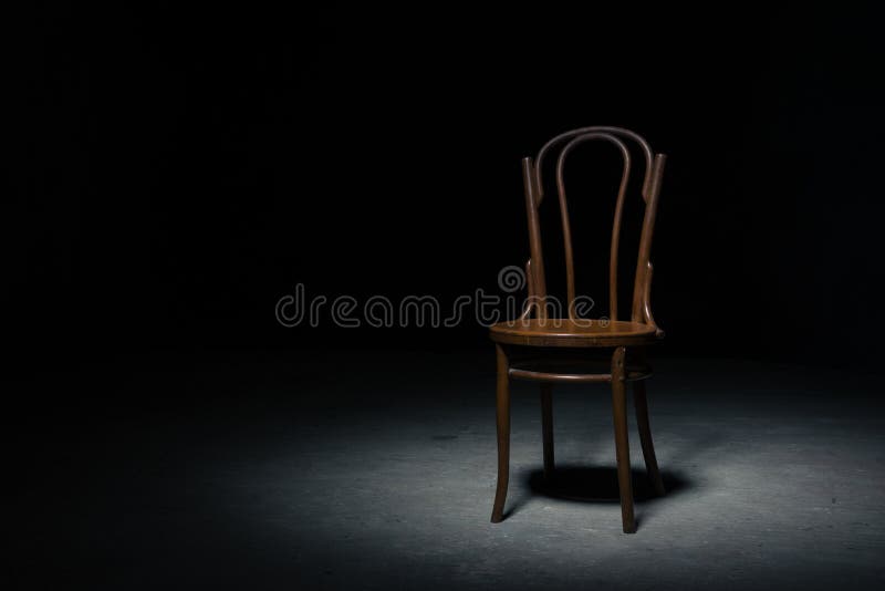 Lonely chair at the empty room