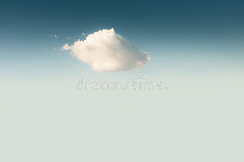 Lonely cloud in the blue sky. royalty free stock photo