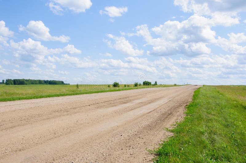 Lonely country road receding to the horizon