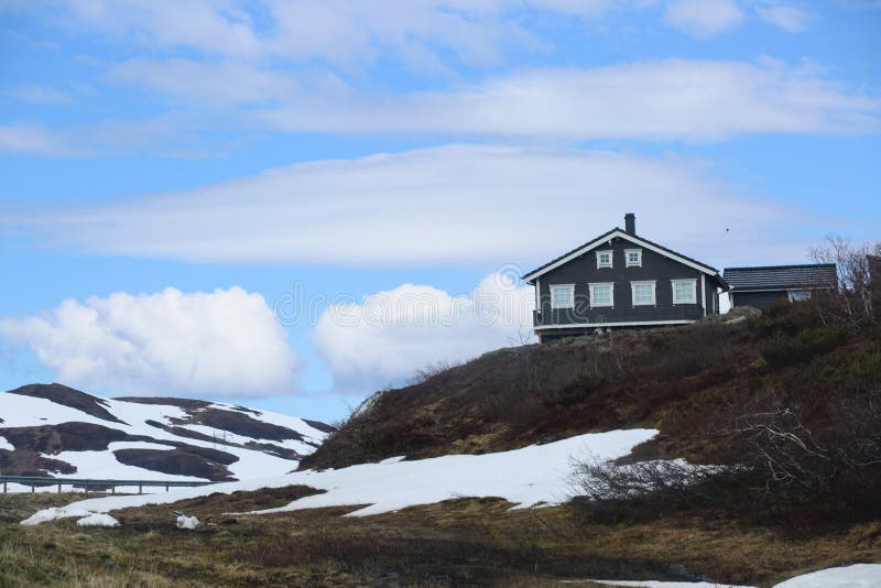 A lonely house on a mountain, spring Norway. A lonely house on a mountain, spring Norway