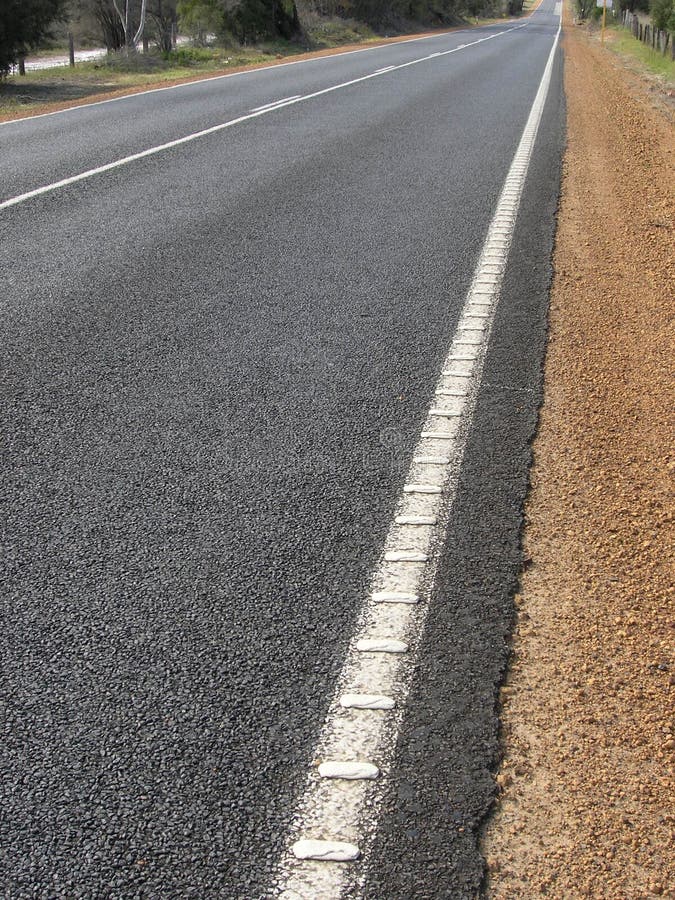 Quiet road stretching into distance. Quiet road stretching into distance.