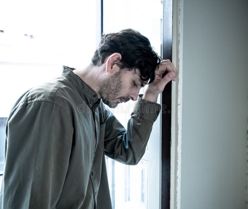 Young Man by the Window Looking Outside Stock Photo - Image of  disappointment, grief: 85427746