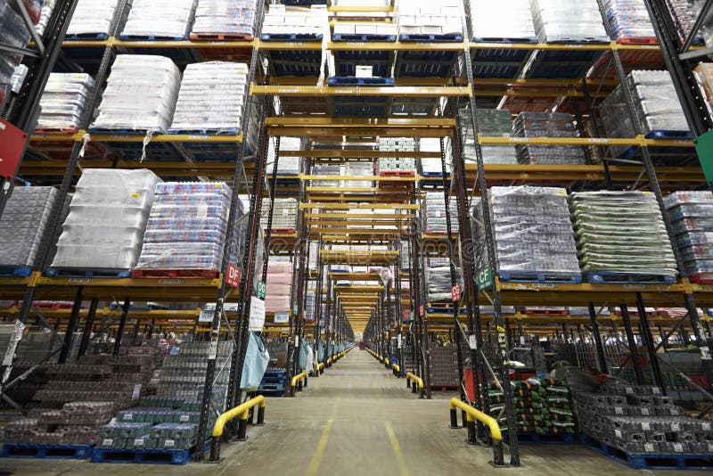 Long aisle between storage racks in a distribution warehouse
