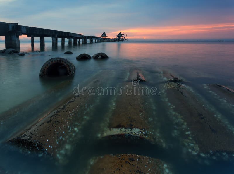 The long bridge over the sea with a beautiful sunrise, Thailand stock photos The long bridge over the sea with a beautiful sunrise, Thailand stock photos