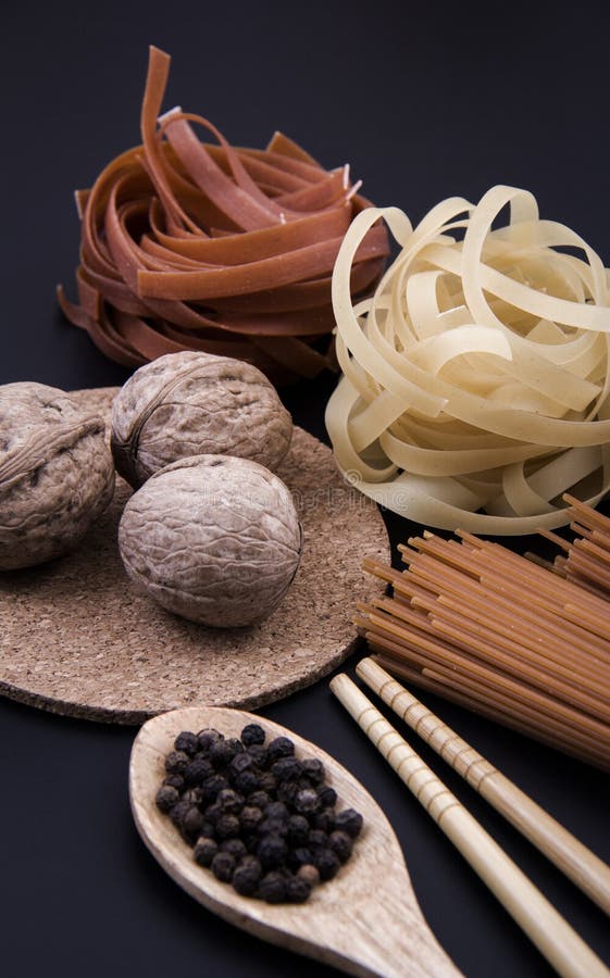 Long Brown Pasta. Pack of Brown Pasta with Macaroni Shape and Colorful