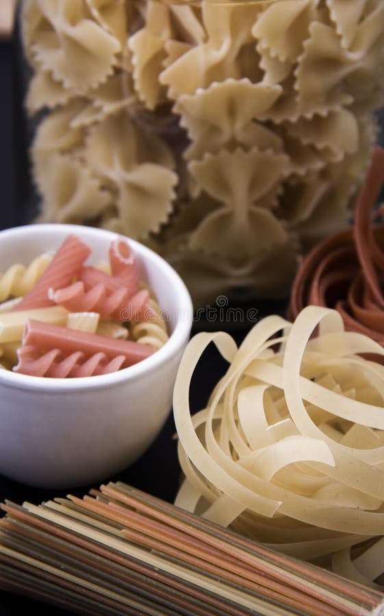 Long Brown Pasta. Pack of Brown Pasta with Macaroni Shape and Colorful