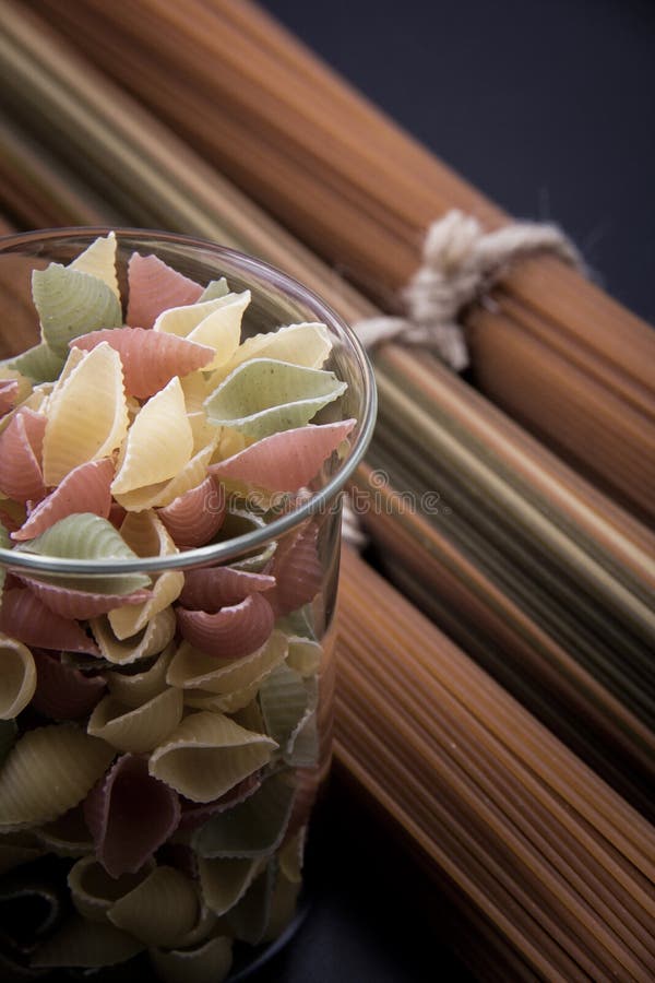 Long Brown Pasta. Pack of Brown Pasta with Macaroni Shape and Colorful