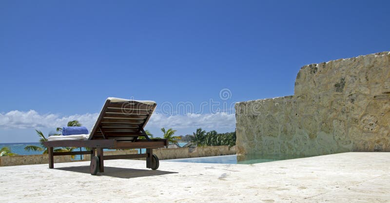 Tropical long chair stock photography