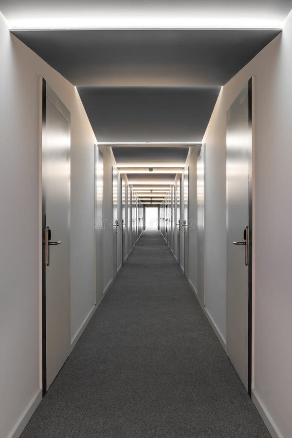 Long Corridor in an Office or Hotel with Room Doors from Both Sides