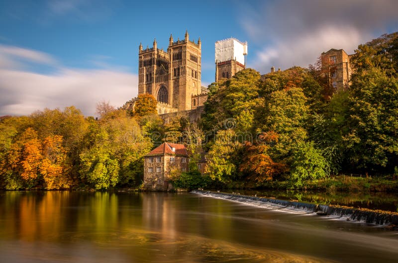 A long exposure of the beautiful Durham Cathedral and the Old Fulling Mill, with the autumn colors reflecting in the River Wear