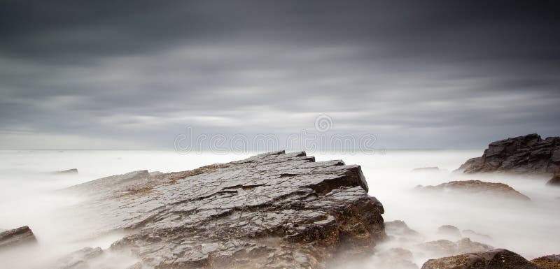 Misty sea and rocks