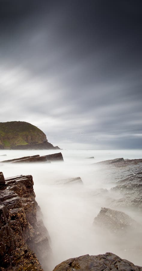 Misty sea and rocks