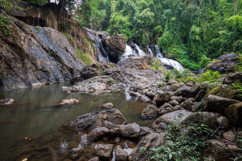 Long exposure picture of waterfall in the forest, blurred motion of water royalty free stock photography Long exposure picture of waterfall in the forest, blurred motion of water royalty free stock photography