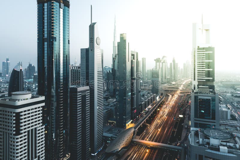 Long Exposure View of Traffic and Skyline from Rooftop at Sunset Dubai