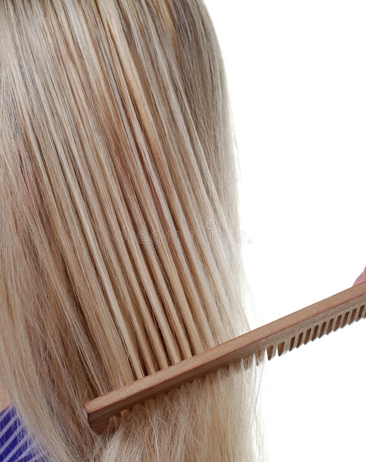 Long hair and comb stock image. Image of human, blond 7530487