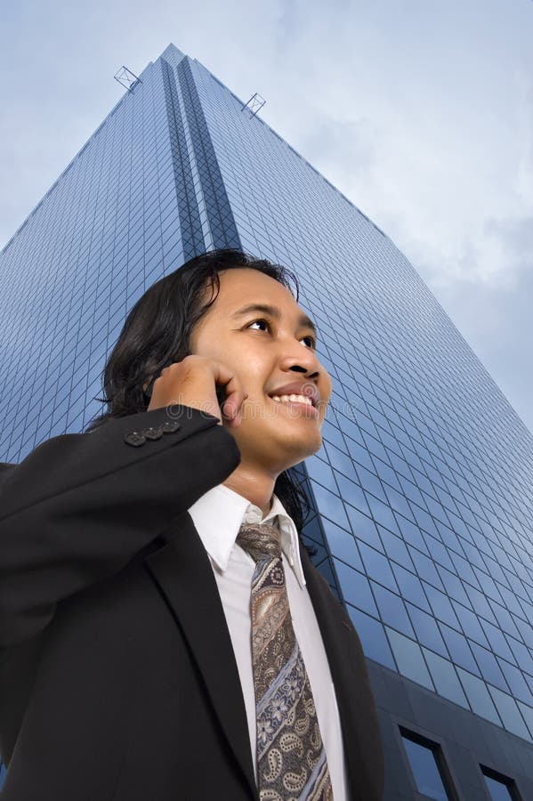 Long Hair Man Making A Call