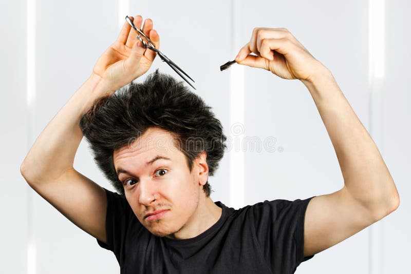 Long Hair Man Shears Hair and Looks in Camera, on a White Background Stock Image Image of
