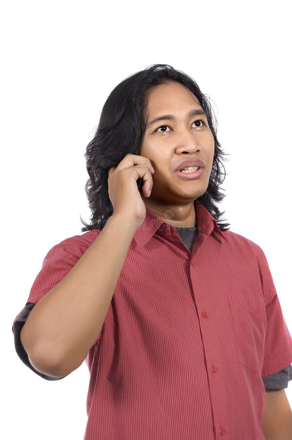 Long Hair Man Using Phone