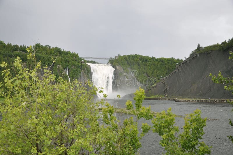 Long Ladder climbing the mountain from Montmorency Falls in Quebec Province in Canada royalty free stock photo Long Ladder climbing the mountain from Montmorency Falls in Quebec Province in Canada royalty free stock photo