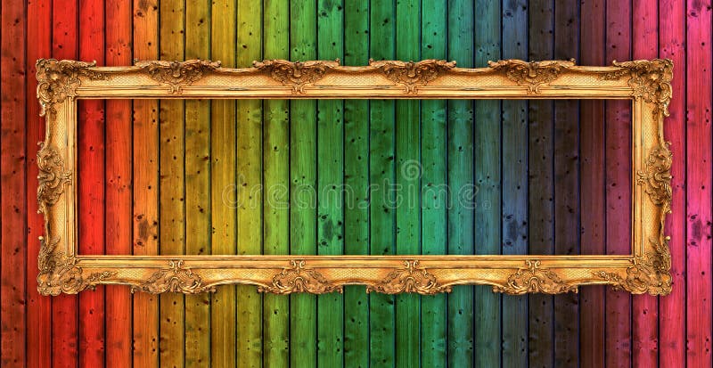 Long old golden frame over colorful wooden wall royalty free stock images