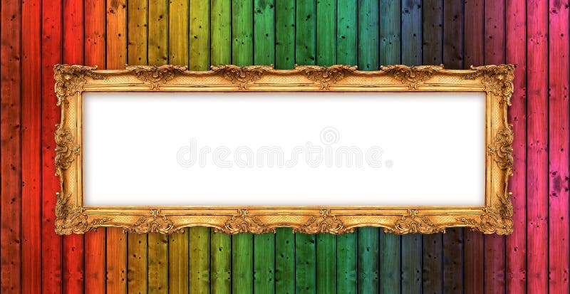 Long old golden frame over colorful wooden wall stock photography
