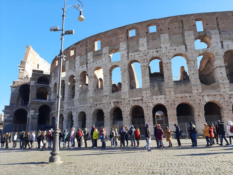 Long queue to enter at Coliseum of Rome royalty free stock image