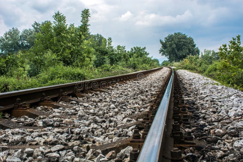 Long Railroad against beautiful blue cloudy sky in nature royalty free stock photo Long Railroad against beautiful blue cloudy sky in nature royalty free stock photo