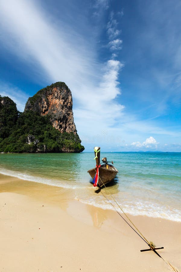 Long tail boat on beach, Thailand