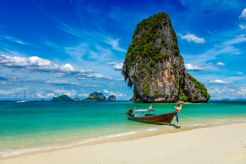 Long tail boat on beach, Thailand