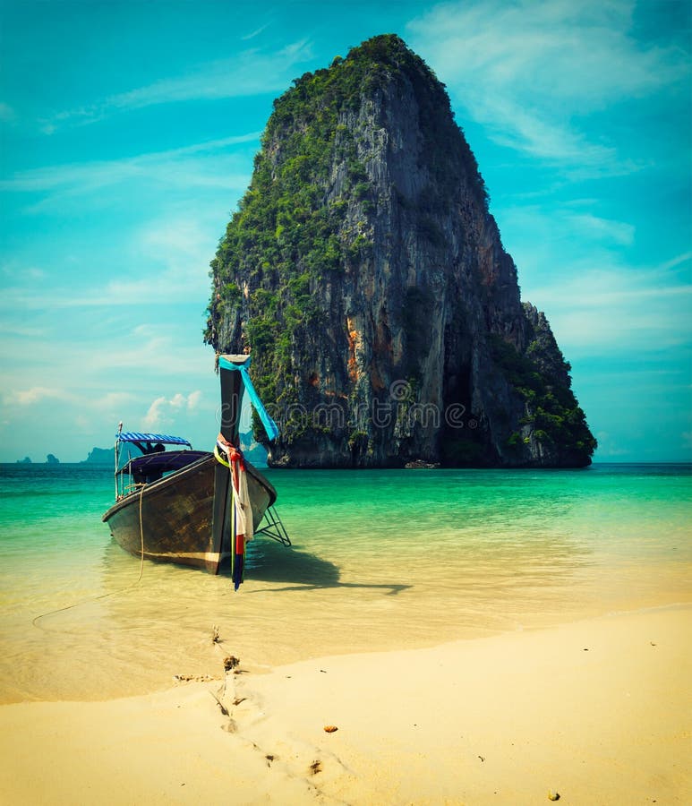 Long tail boat on beach, Thailand