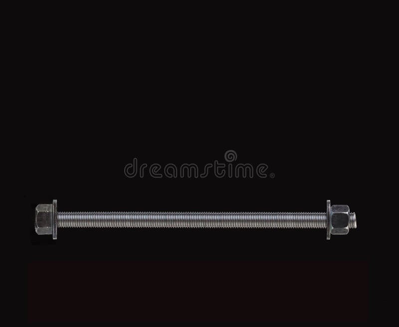Long Threaded Metal Bolt that Ends with Washer and Nut Stock Image