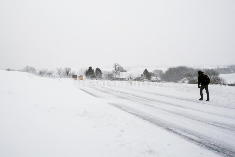 Long walk along snowy road.