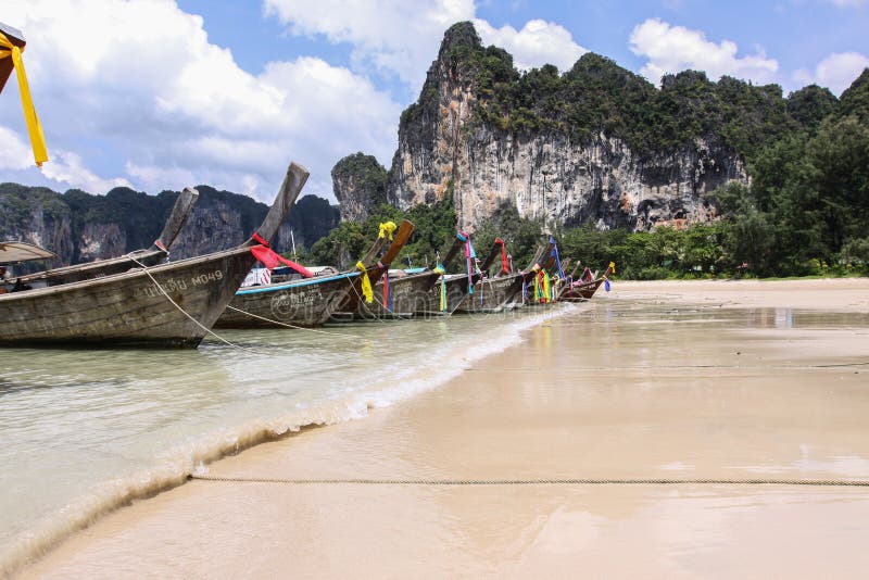 Longtail Boats on a Thailand Beach stock photos Longtail Boats on a Thailand Beach stock photos