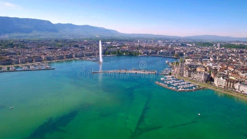 Longueur 4K aérienne de ville de Genève en Suisse - UHD banque de vidéos